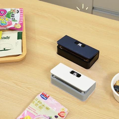 Portable Mini Bag Sealer USB Rechargeable – Handheld Food Sealer with Built-In Cutter for Fruits, Vegetables, Snacks & Chips – Compact Kitchen & Outdoor Picnic Sealing Tool, White & Blue